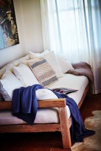 Postel nebo postele na pokoji v ubytování Thamarra Cottage