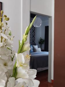 Postel nebo postele na pokoji v ubytování Maya Homestay Putrajaya