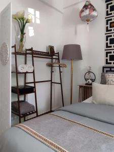 Postel nebo postele na pokoji v ubytování Maya Homestay Putrajaya