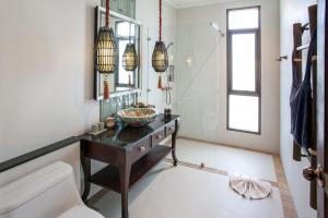 Voodi või voodid majutusasutuse Sriwilai Sukhothai toas