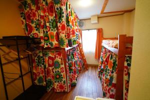 Voodi või voodid majutusasutuse DEER Hostel OSAKA NAMBA toas