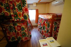 Voodi või voodid majutusasutuse DEER Hostel OSAKA NAMBA toas