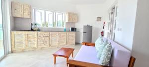 Kuchyň nebo kuchyňský kout v ubytování Harmony Self-Catering Apartments