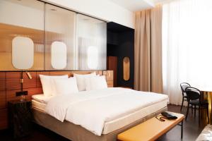 Postel nebo postele na pokoji v ubytování Solo Sokos Hotel Helsinki