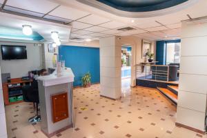 TV a/nebo společenská místnost v ubytování Anita Hotel