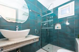 A bathroom at Stratos Deluxe Apartments