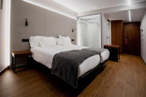 Ein Bett oder Betten in einem Zimmer der Unterkunft Les Closes
