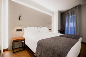 Ein Bett oder Betten in einem Zimmer der Unterkunft Les Closes