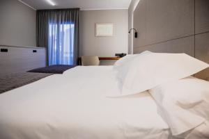 Ein Bett oder Betten in einem Zimmer der Unterkunft Les Closes