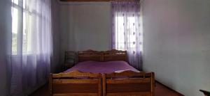 Voodi või voodid majutusasutuse Guest house Katia toas