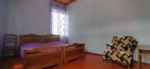 Voodi või voodid majutusasutuse Guest house Katia toas
