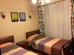 Llit o llits en una habitació de Apartment in Golf Porto Marina