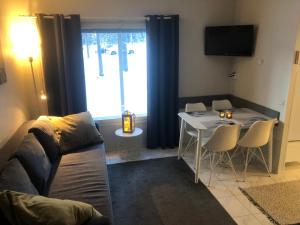 Posezení v ubytování Ylläs Kanerva 106 + 18 fotografií