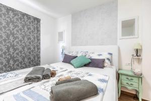 Postel nebo postele na pokoji v ubytování Villa Azuro
