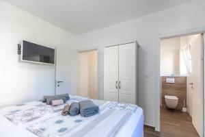Postel nebo postele na pokoji v ubytování Villa Azuro