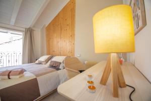 Postel nebo postele na pokoji v ubytování B&B Le Casette Chieti