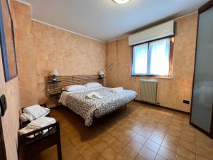 Posteľ alebo postele v izbe v ubytovaní Silicella Apartment