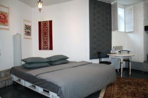Postel nebo postele na pokoji v ubytování Mamba Hotel
