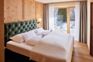 Voodi või voodid majutusasutuse Natur Resort RISSBACHER toas