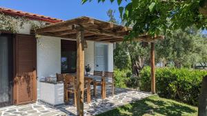 Zahrada ubytování Bungalows Iphigenia