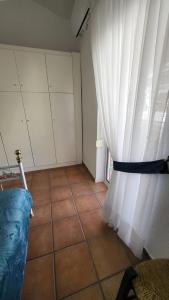 Posteľ alebo postele v izbe v ubytovaní Mina House Siviri