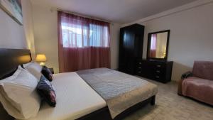 Posteľ alebo postele v izbe v ubytovaní Mina House Siviri