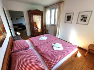 Tempat tidur dalam kamar di Ferienlodge von Scotti
