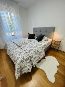 Posteľ alebo postele v izbe v ubytovaní Apartment Allora