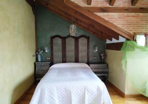 A bed or beds in a room at Camino a Casa - Suances