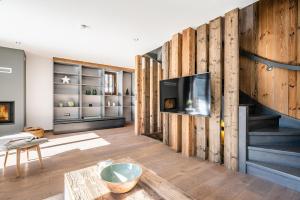 Televízia a/alebo spoločenská miestnosť v ubytovaní Chalet Badi Argentière Chamonix - by EMERALD STAY