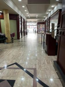 an empty lobby with a hallway with a lobby at Apartment Alpi in Peje