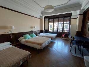 Postel nebo postele na pokoji v ubytování Zentric Hostel
