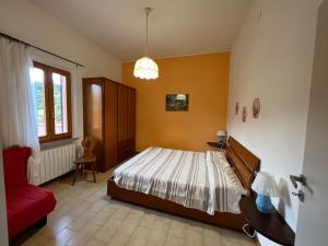 Voodi või voodid majutusasutuse Appartamenti Lucry toas