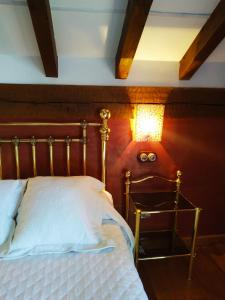 A bed or beds in a room at Camino a Casa - Suances