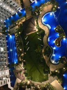 an aerial view of a river in the middle of a building at Shore Residence D1,shortwalk MALL OF ASIA near airport wifi in Manila