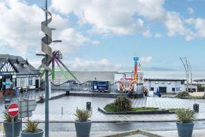a view of an amusement park with a roller coaster at APARTMENT 2 and 4 - PORTRUSH MARINE APARTMENTS in Portrush