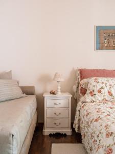 Un pat sau paturi într-o cameră la Villa Diletta b&b