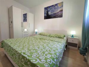 Posteľ alebo postele v izbe v ubytovaní Apartman Kamenjak