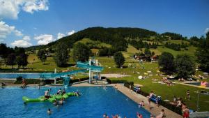 Utsikt över poolen vid SkiJuwel Appartments Auffach - Wildschönau - Tirol eller i närheten