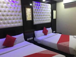Ένα ή περισσότερα κρεβάτια σε δωμάτιο στο Hotel Bestend