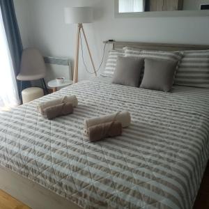 Ένα ή περισσότερα κρεβάτια σε δωμάτιο στο Apartman Nice +12 φωτογραφίες