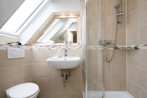 Ein Badezimmer in der Unterkunft Süderliebe
