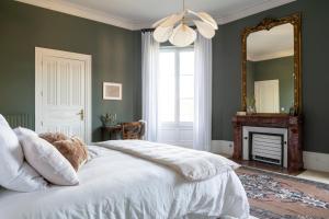 Katil atau katil-katil dalam bilik di Château Toulouse-Lautrec