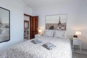Postel nebo postele na pokoji v ubytování Comfortable and modern apartment next to the Avenida central in Tías