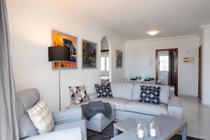 Posezení v ubytování Comfortable and modern apartment next to the Avenida central in Tías