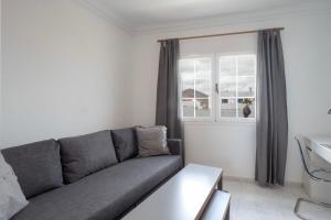 Posezení v ubytování Comfortable and modern apartment next to the Avenida central in Tías
