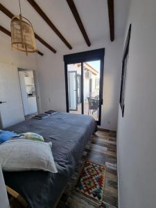 Posteľ alebo postele v izbe v ubytovaní Casa Lina del Mar
