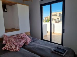 Posteľ alebo postele v izbe v ubytovaní Casa Lina del Mar
