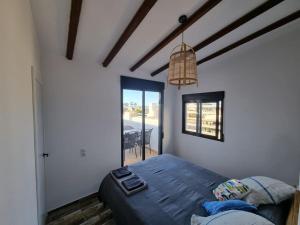 Posteľ alebo postele v izbe v ubytovaní Casa Lina del Mar