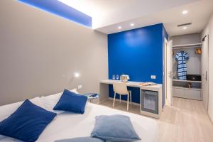 Llit o llits en una habitació de Amarina Hotel